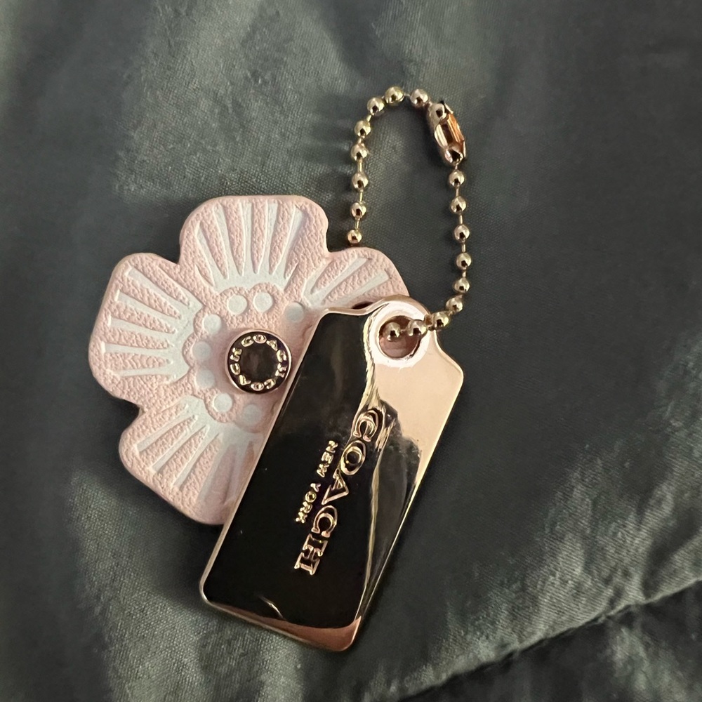 Coach leather floral hang tag rose gold